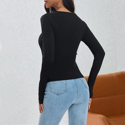Irregularly Arranged Buttons Create A Sophisticated Top